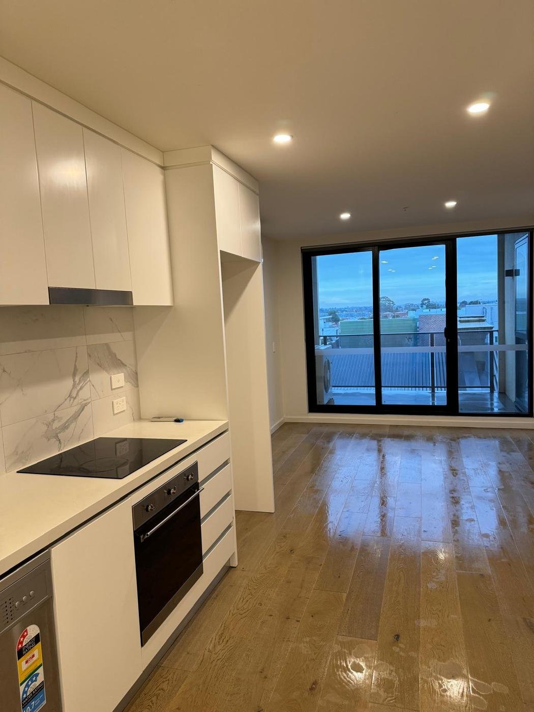 Clean apartment kitchen and living space in Melbourne