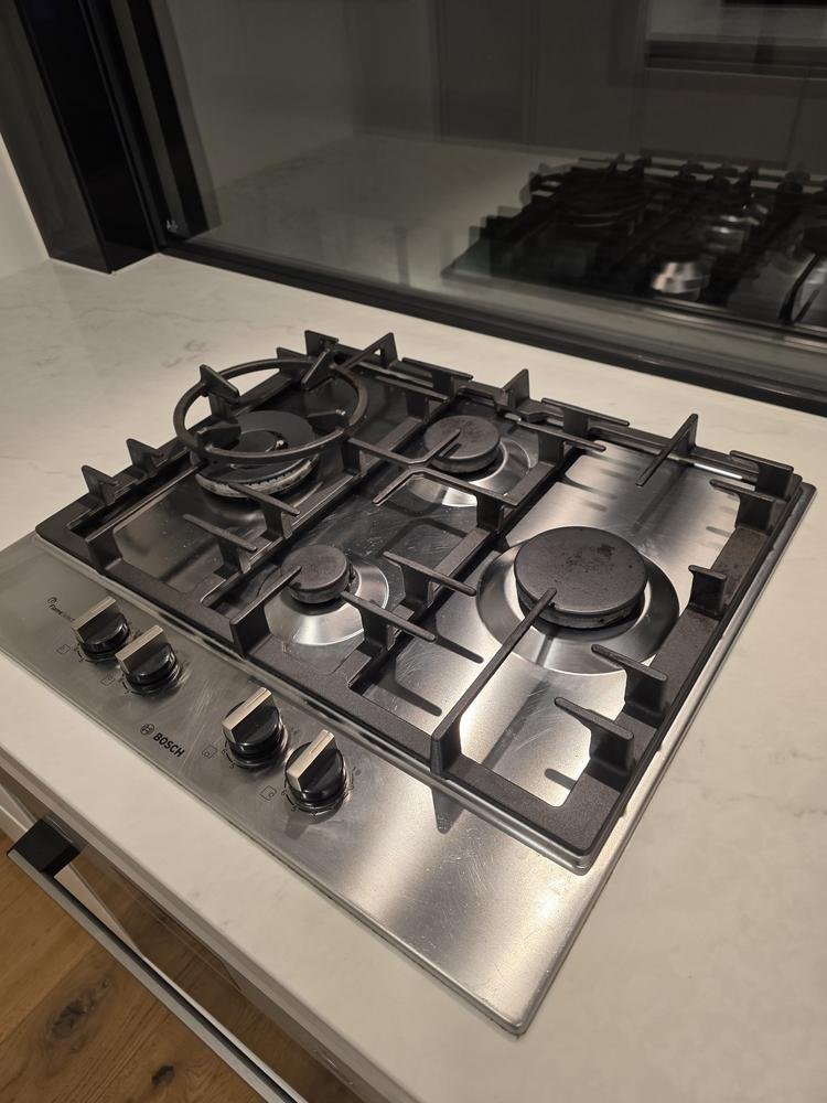 Clean stainless-steel gas cooktop