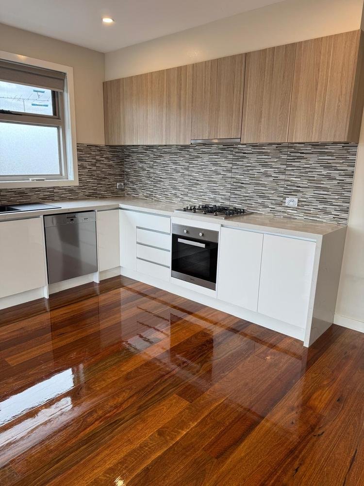Clean kitchen and polished timber floor