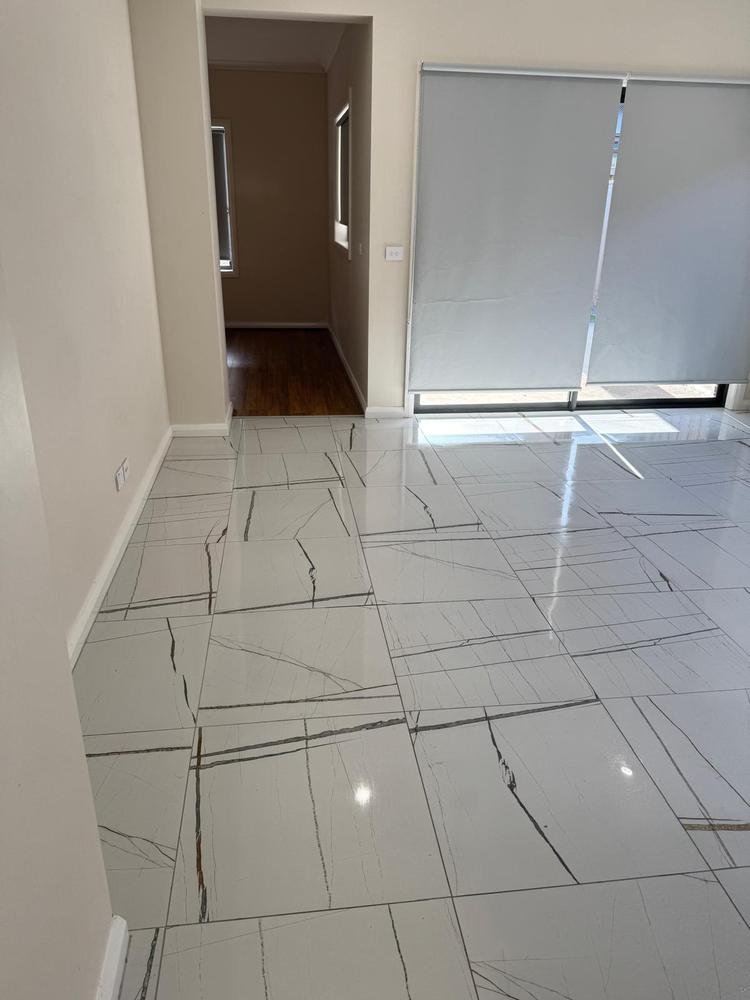 Marble-look tiled floor after cleaning