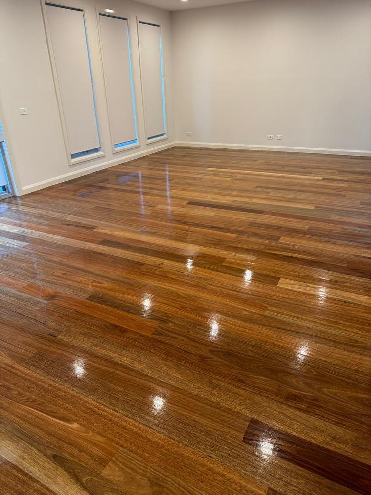 Empty living room with polished timber floor