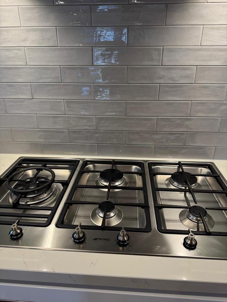 Stainless-steel gas cooktop after cleaning