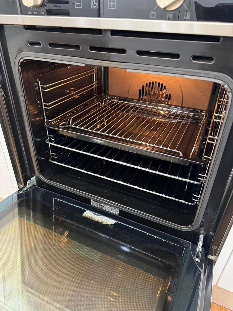 Open wall oven after cleaning